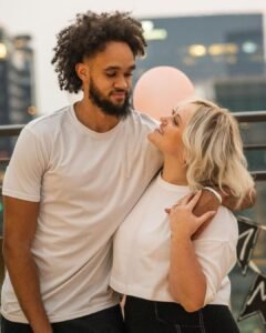 Derrick White with his wife